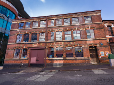 Exterior view of the front of Newman Brothers workshops from Fleet Street